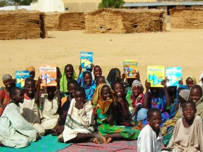 Darfuri children celebrate arrival of English books donated by Book Wish Foundation